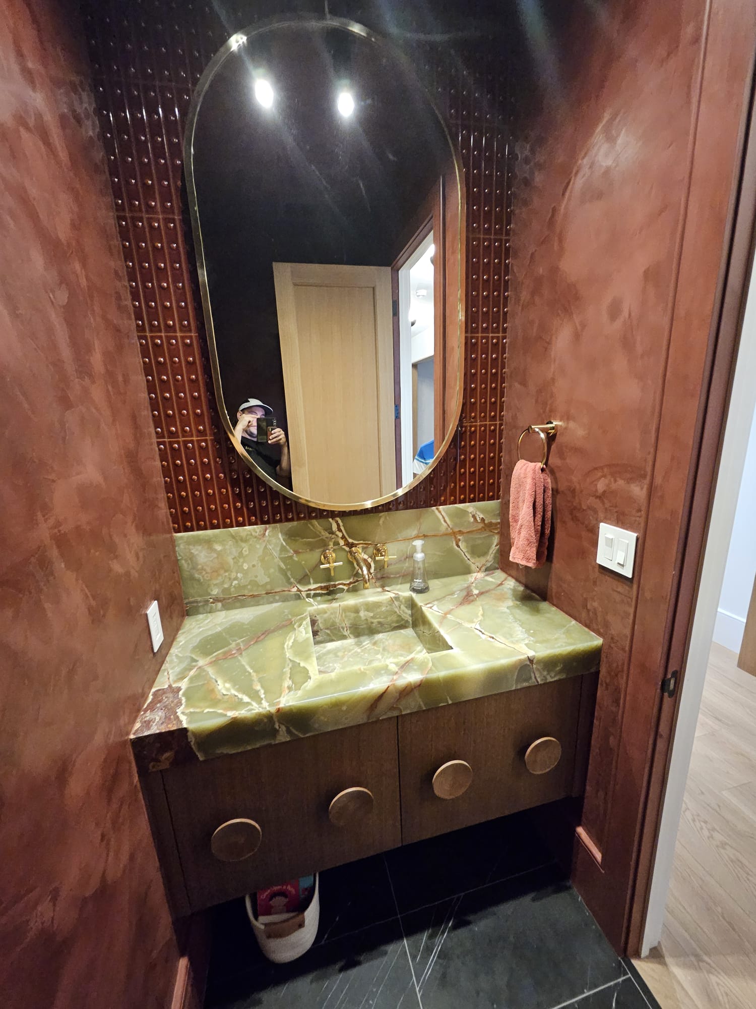 Residential renovation — modern powder room with custom vanity